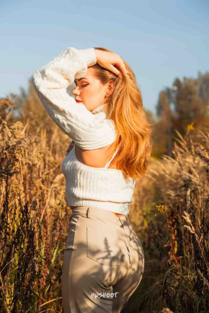 Close-up portrait of Adele in golden autumn light during a Calgary photoshoot
